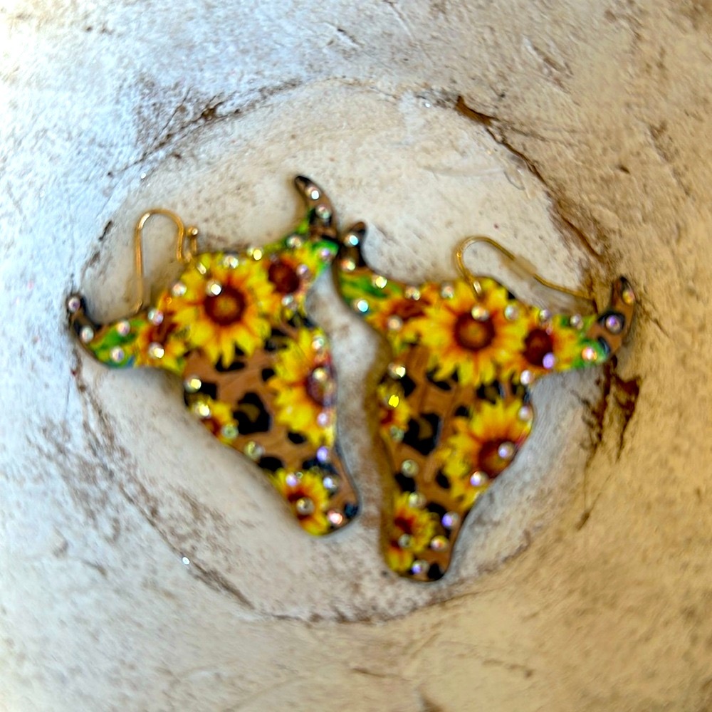 Bullhorn leather sunflower earrings . .With crystals /for a little bling  💎